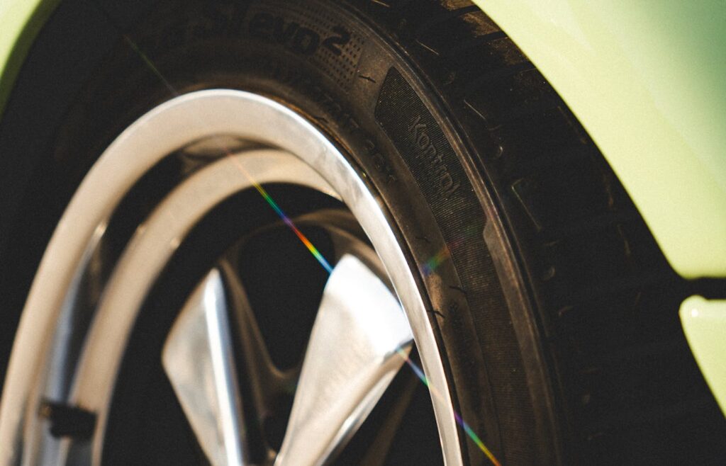 Close-up of a car tire and alloy wheel