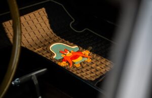 Black rubber car floor mat on the driver side floor