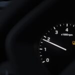 Car tachometer with a tire pressure warning light