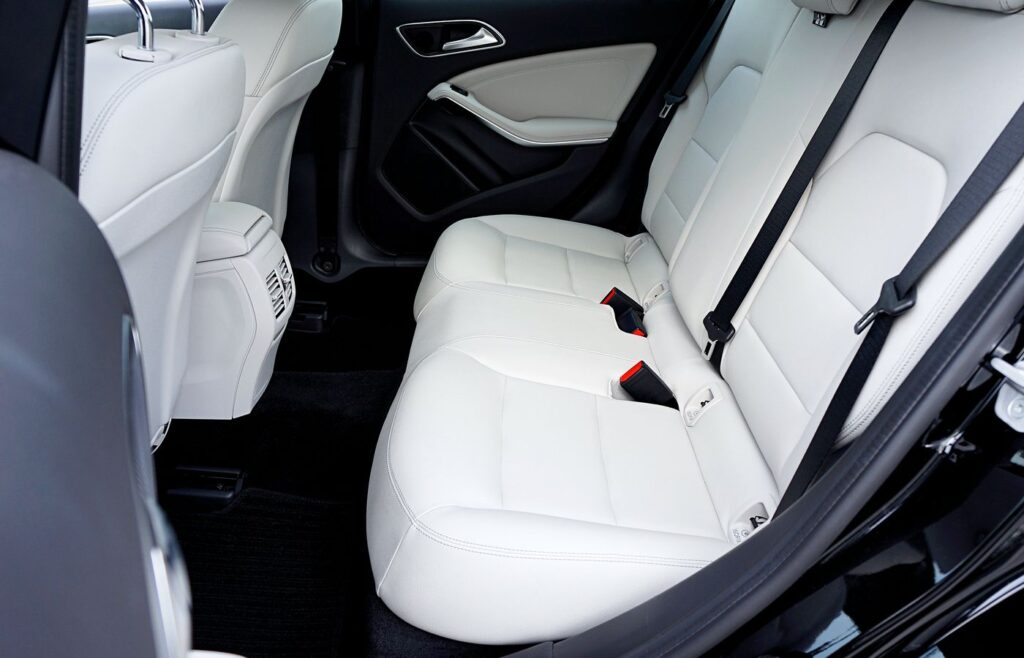 White car seats inside a clean vehicle interior
